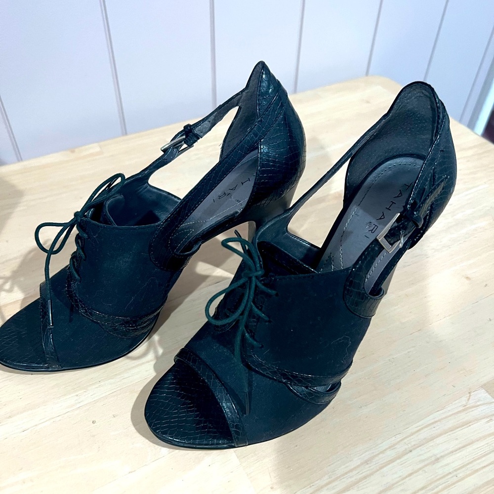 Tahari black lace up heels with side fasten. Slightly worn